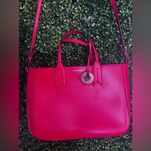 Catch attention with this red tote bag